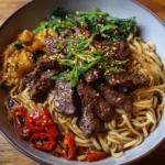 Asian-Style Beef Noodle Dish First Image